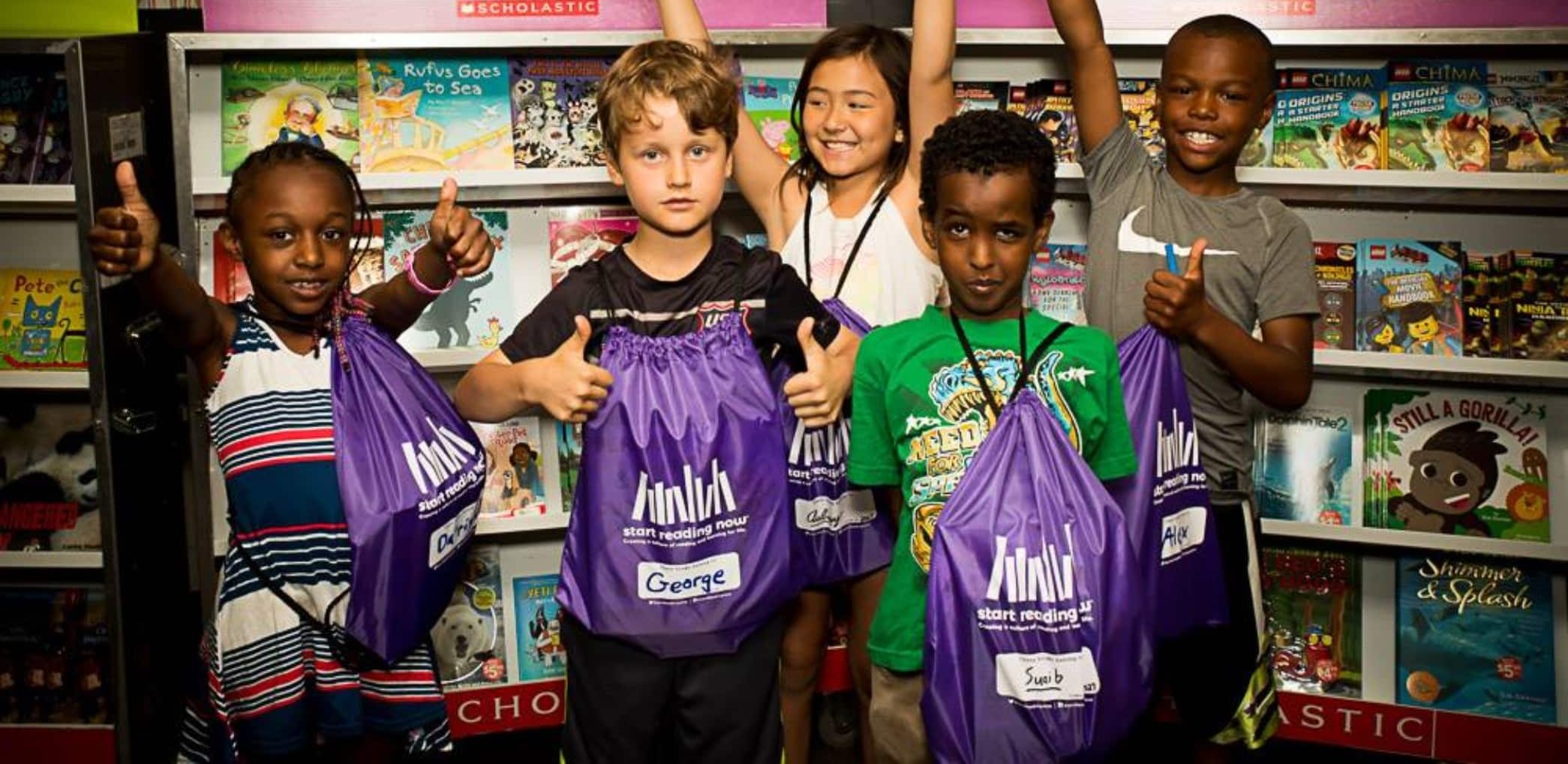Kids at a Start Reading Now book fair