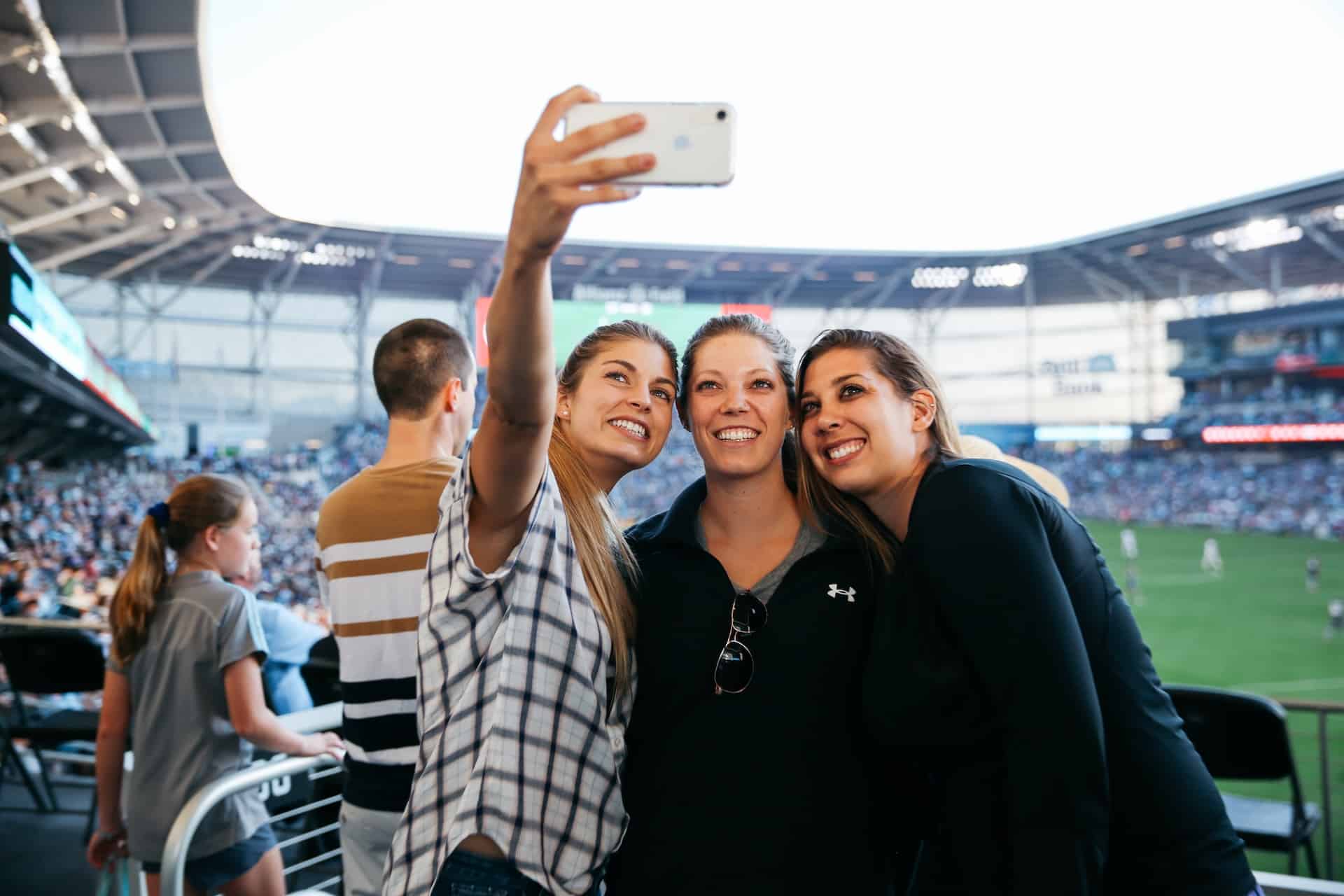 Fans taking selfies at Allianz Field